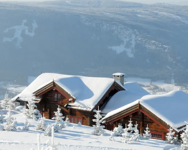 Fakkelmannen over hytter i Hafjell