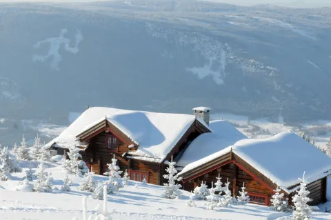 Fakkelmannen over hytter i Hafjell
